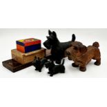 Mixed Treen lot comprising four carved wooden terriers, a parquetry inlaid cribbage board and two