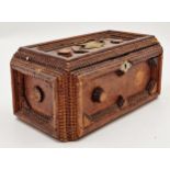 Primitive tramp art casket hinged lid with gilt handle enclosing a paper lined interior with mirror,