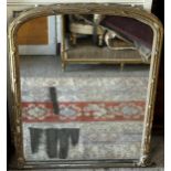 Antique Florentine giltwood overmantel mirror the original pitted glass framed by various darted and