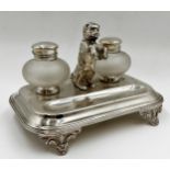 Good quality silver plated novelty desk standish centrally fitted with a cast hound stood on its