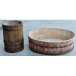 Antique coopered oak barrel (lacks top), 50 x 34cm, together with a coopered half barrel planter (2)