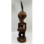 Tribal Interest - Songye power figure from DR Congo, with applied horn and studded decoration,