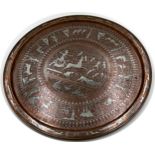 Large copper and silver applied Egyptian charger with various figures and scenes, 65cm diameter.