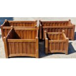 A pair of teak garden planters plus two others, of varying size largest 91cm L smallest 45cm L (4)