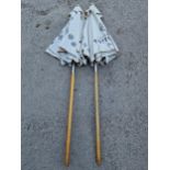 Pair of Taittinger garden parasols (2)