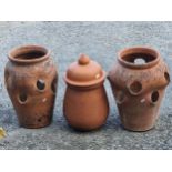 A pair of terracotta strawberry planters together with one other terracotta olive pot (3).