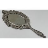 Good quality late Victorian silver hand mirror, pierced with cherubs and flowers, maker David