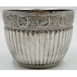 Good late 19th century silver rice bowl, the rim with panels of animals over scrolled foliage,