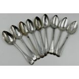 Nine Georgian and later silver dessert spoons, 12oz approx