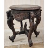 Eastern carved hardwood pot stand or occasional table, the top with darted borders on four