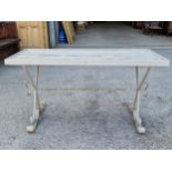 Antique cast iron table with plank top on scrolled supports and painted finish 62 x 126cm