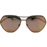 A pair of brand new mirrored Bulgari sunglasses with rose gold-toned hardware. Comes with hard