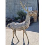 A large impressive driftwood sculpture of a stag, 212cm high