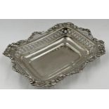 Good Victorian silver serving dish, the rim embossed with flowers and pierced diaper decoration,