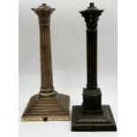Two similar silver plated Corinthian column table lamps, converted to electricity, 33cm high (2)