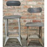 Graduated pair of machinist stools, with moulded seats and steel frames (2).