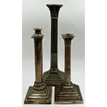 Three silver plated Corinthian column table lamps, the largest 46cm high
