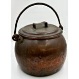 Antique copper lidded cauldron with wrought iron hinged handle, 34cm high