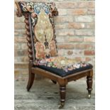 19th century walnut prayer chair with wool-work stuff-over back and seat with rococo floral panels