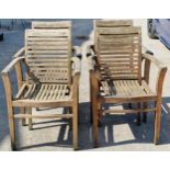 A set of four Cotswold Collection weathered teak garden armchairs with slatted backs, 86 x 63cm (4)