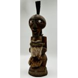 Tribal Interest - Songye power figure from DR Congo, with applied horn and fur pelt decoration, 55cm