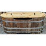 A good coopered barrel bath tub/planter with removable lid and drainage hole, 64cm high x 160cm long