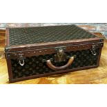 A stunning Louis Vuitton 'Alzer 60' vintage hard suitcase formerly belonging to the Earl of