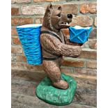 Majolica style pottery Blackforest fireside bear, holding two turquoise glazed vessels, open mouth