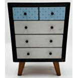 1950s formica table top or apprentice chest of drawers, with baise lined drawers and tapered legs,