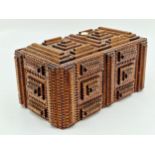 Primitive tramp art box/caddy the lid enclosing a red painted interior, 40cm x 24cm with a further