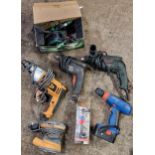 Four electric drills of various brands to include JCB, Bosch and Black and Decker, together with a