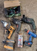 Four electric drills of various brands to include JCB, Bosch and Black and Decker, together with a