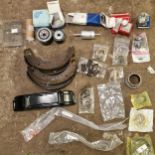 Collection of vintage tractor parts mainly for Massey Fergusons to include springs, brake shoes,