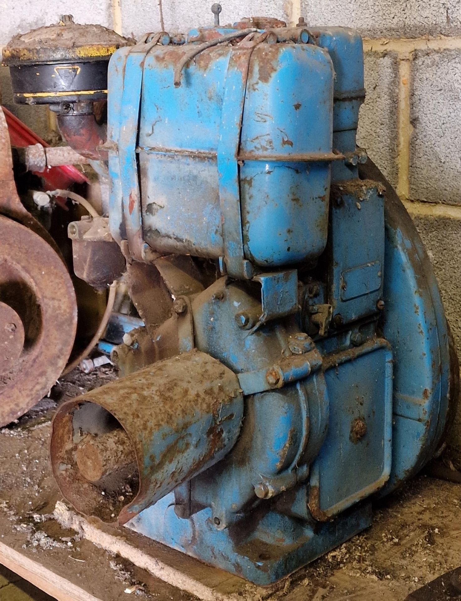 Vintage Lister stationary engine with blue painted finish