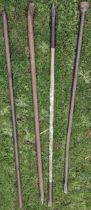 Four vintage iron digging/pry bars together with a vintage iron post thumper (5)