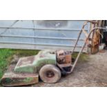 Vintage Champion mower together with a vintage Vega electric power washer (2)