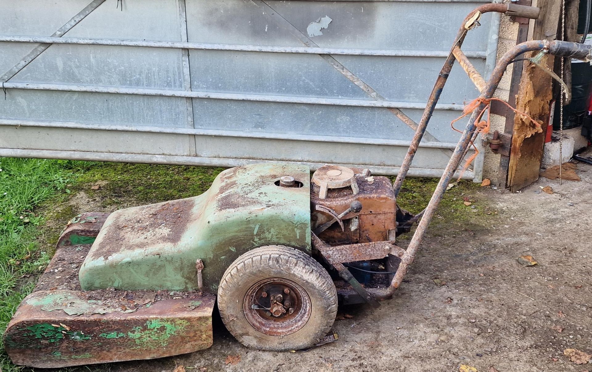 Vintage Champion mower together with a vintage Vega electric power washer (2)