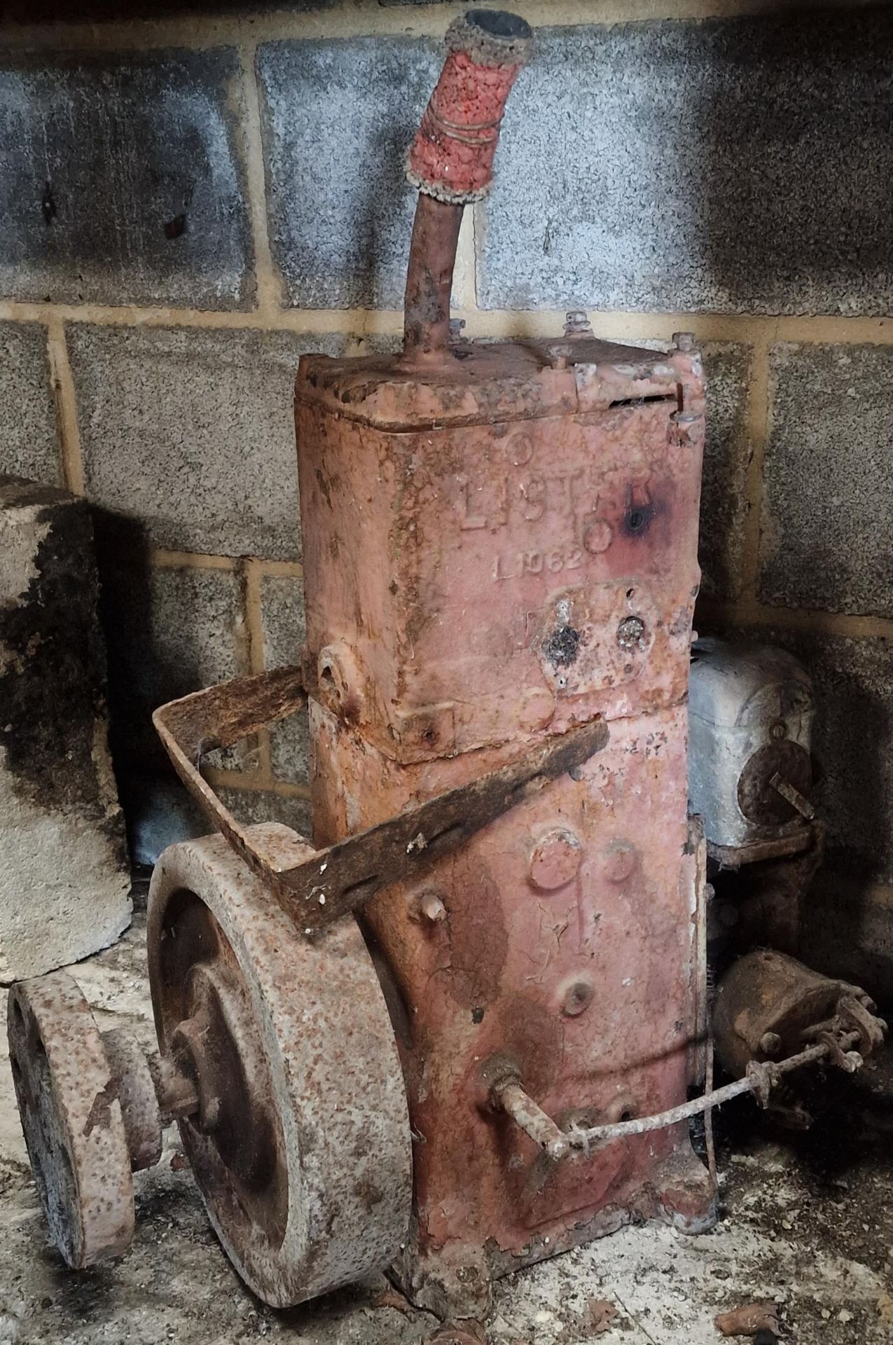 Pair of vintage Lister 1-1062 stationary engines together with further stationary engine parts,