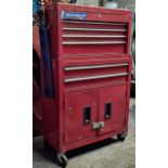 Metal two tier stacking tool cabinet complete with a large assortment of good tools and hardware,