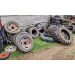 Collection of tyres and inner tubes, varying sizes