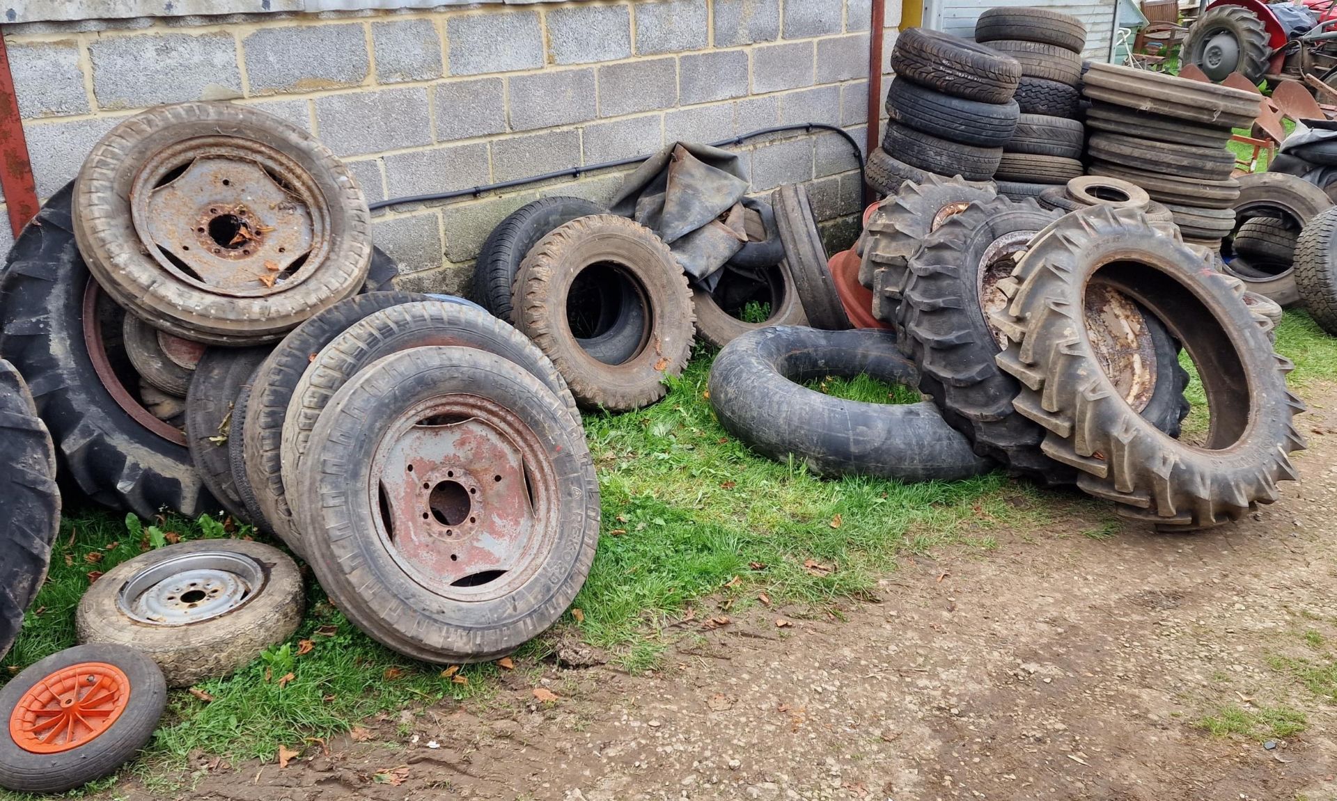 Collection of tyres and inner tubes, varying sizes
