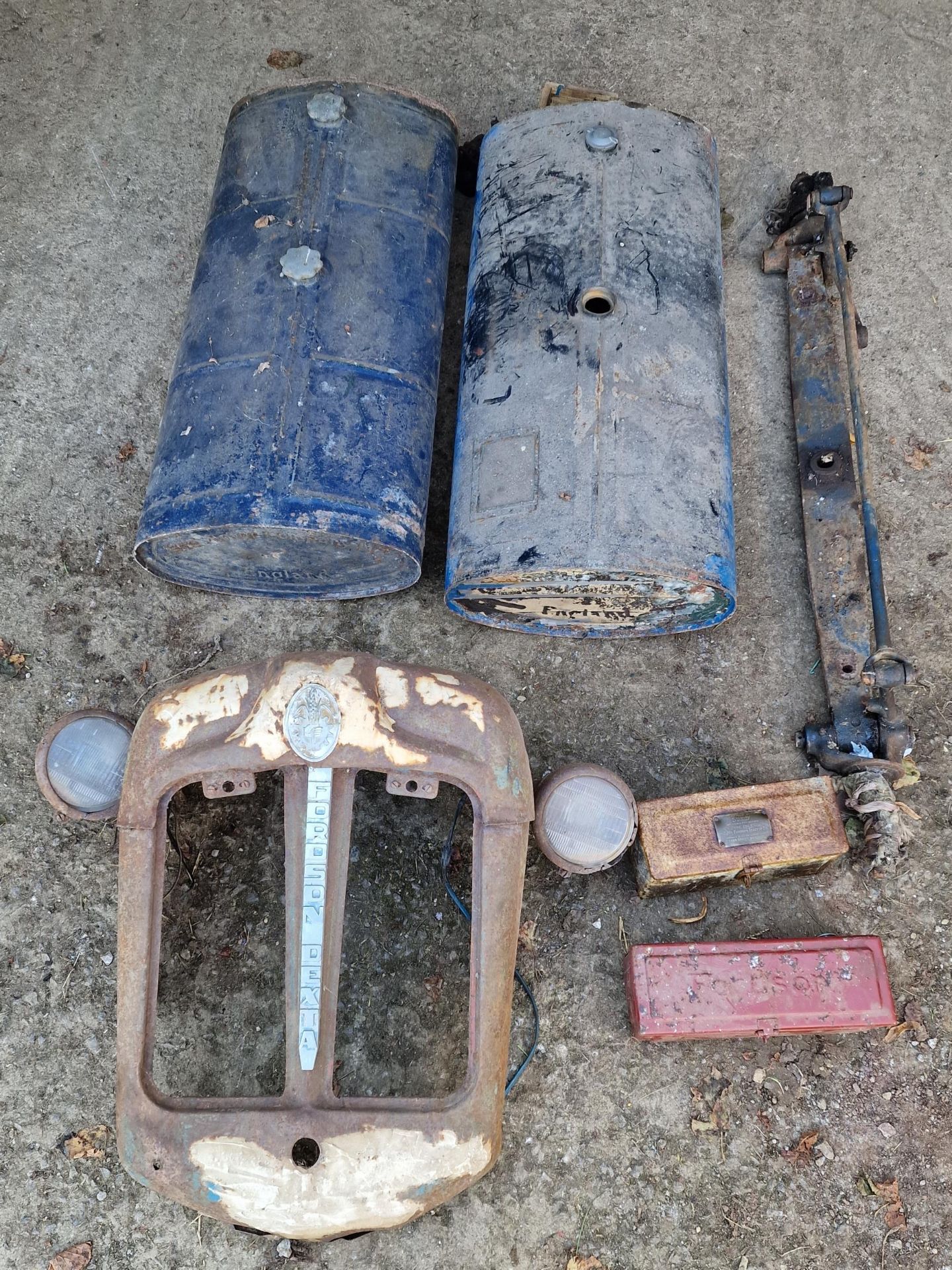 Collection of vintage Fordson Standard parts to include fuel tanks, front axle, toolboxes etc