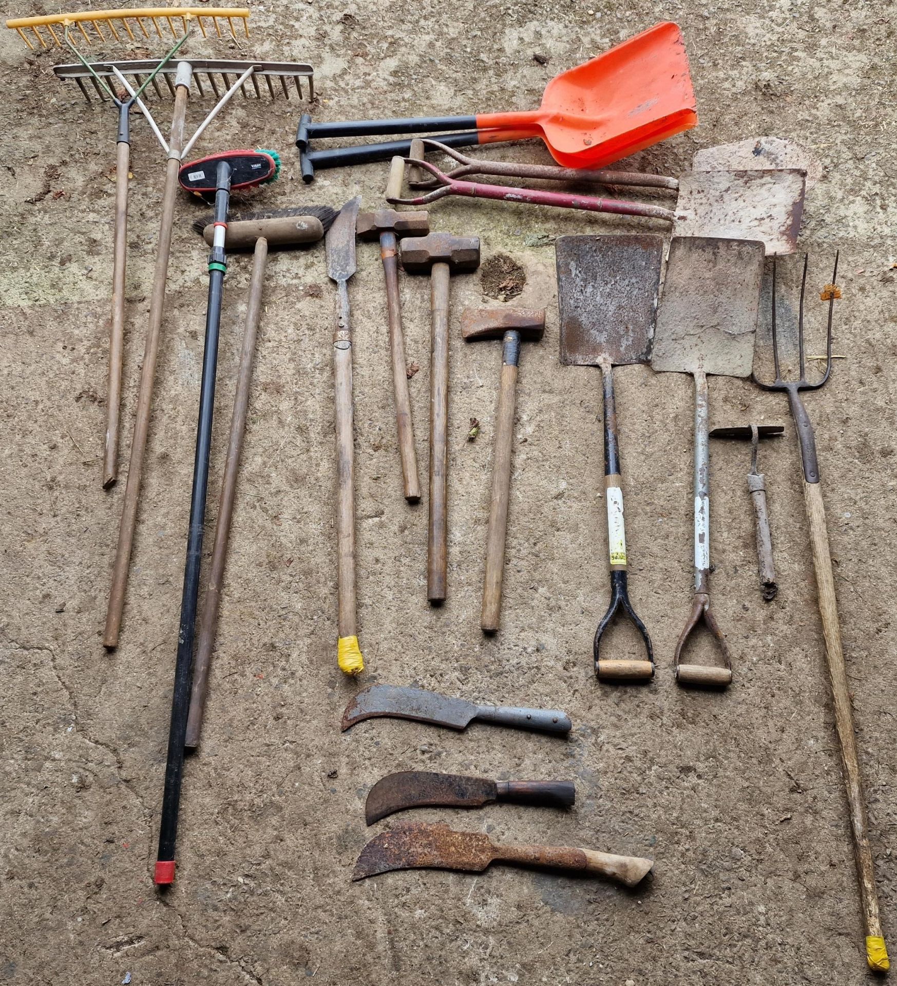 Collection of hand tools to include spades, sledgehammers, billhooks etc