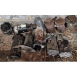 Collection of vintage Massey Ferguson tractor parts containing mainly starting motors