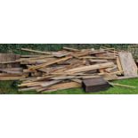 Large wood pile of various timbers