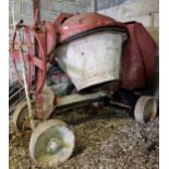 Large vintage diesel powered cement mixer powered by a Lister engine