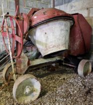 Large vintage diesel powered cement mixer powered by a Lister engine
