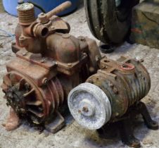 Two vintage water pumps together with a vintage belt drive machine (incomplete) (3)