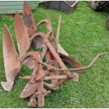 Vintage three furrow tractor plough