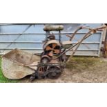 Vintage Atco lawnmower with collection bucket together with another vintage Atco mower, for